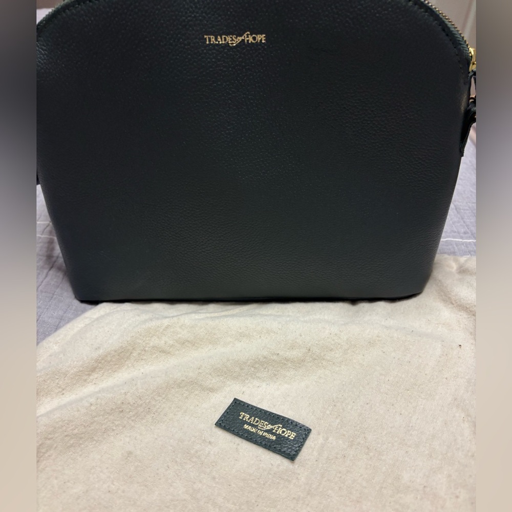 Olive green leather crossbody bag. Trades of Hope brand.